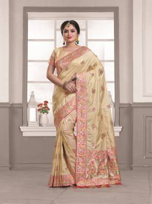 Simple, Rich And Elegant Looking Saree Is Here In Cream Color Paired With Cream Colored Blouse. This Saree And Blouse Are Fabricated On Art Silk Beautified With Weaving And Lace Border. Buy This Simple Saree Now.