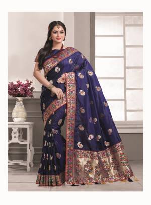 Enhance Your Personality Wearing This Beautiful And Rich Saree In Navy Blue Color Paired With Navy Blue Colored Blouse. This Saree And Blouse Are Fabricated On Art Silk Beautified With Bold Multi Colored Weave All Over The Saree. Buy Now.