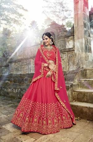 Look Pretty Attractive Wearing This Designer Lehenga Choli In Dark Pink Color Paired With Dark Pink Colored Dupatta. This Lehenga Choli Are Fabricated On Soft Silk Paired With Chiffon Dupatta. It Has Heavy Embroidery Making the Lehenga Attractive.