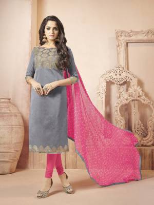 Flaunt Your Rich And Elegant Taste Wearing This Suit In Grey colored Top Paired With Contrasting Pink Colored Bottom And Dupatta. This Dress Material Is Fabricated On Banarasi Art Silk Paired With Cotton Bottom And Chiffon Dupatta. 