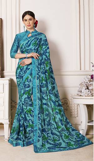 Attract All wearing This Pretty Saree In Blue Color Paired With Blue Colored Blouse. This Saree IS Fabricated On Georgette Paired With Satin Fabricated Blouse. Both Its Fabrics Are Soft Towards Skin And Easy To Carry All Day Long.