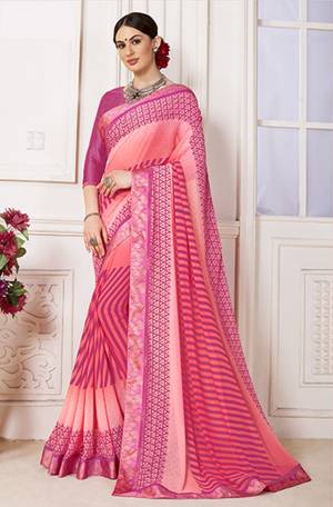 Look Pretty Wearing This Pink Colored Saree Paired With Pink Colored Blouse. This Saree IS Fabricated On Georgette Paired With Satin Fabricated Blouse Beautified With Prints. Buy This Saree Now.