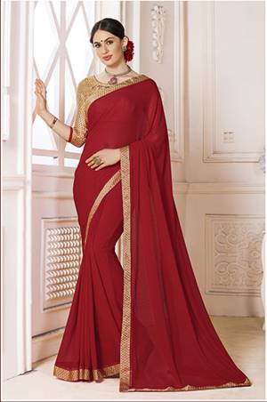 Adorn The Lovely Angelic Look Wearing This Elegant Looking Saree In Red Color Paired With Beige Colored Blouse. This Saree Is Fabricated On Georgette Paired With Satin Fabricated Blouse. It Is Light Weight And Easy To Carry All Day Long.