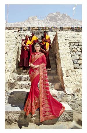 Adorn The Angelic Look Wearing This Beautiful Saree In Red Color Paired With Red Colored Blouse. This Saree IS Fabricated On Chiffon Paired With Art Silk Fabricated Blouse. It Is Beautified With Coding Work. Also It Is Easy To Carry All Day Long.
