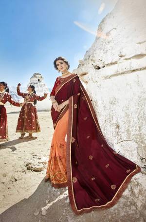 For A Royal Look, Grab This Designer Saree In Maroon And Peach Color Paired With Maroon Colored Blouse. This Saree Is Fabricated On Satin Silk And Georgette Paired With Art Silk Fabricated Blouse. Buy This Saree Now.