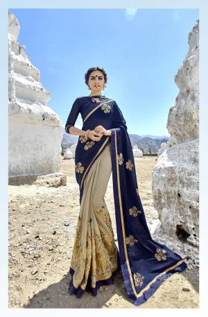 Enhance Your Personality Wearing this Designer Saree In Navy Blue And Grey Color Paired With Navy Blue Colored Blouse. This Saree Is Fabricated On Silk And Georgette Paired With Art Silk Fabricated Blouse. It Has Designer Embroidery Over The Saree.