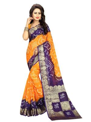 Orange Color Induces Perfect Summery Appeal To Any Outfit, So Grab This Saree In Orange And Purple Color Paired With Orange And Purple Colored Blouse. This Saree And Blouse are Fabricated On Art Silk Beautified With Bandhani Prints All Over. Buy This Saree Now.