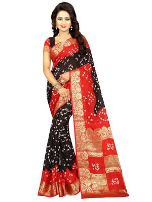 For A Bold and Beautiful Look, Grab This Bandhani Printed Saree In Black And Red Color Paired With Black Colored Blouse. This Saree And Blouse Are Fabricated On Art Silk Beautified With Weave And Prints. It IS Light Weight, Durable And Easy To Carry All Day Long.