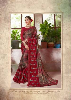 Add This Pretty Saree In Multi And Maroon Color Paired With Maroon Colored Blouse. This Saree Is Fabricated On Crepe Silk Paired With Art Silk Fabricated Blouse. This Saree Is Beautified With Prints And Embroidery. Buy Now.