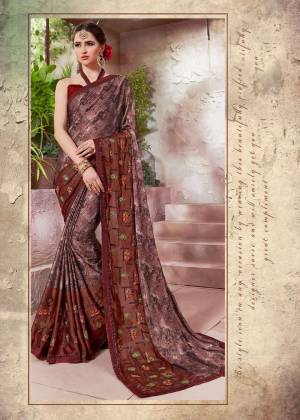 Rich And Elegant Looking Saree Is Here In Brown Color Paired With Brown Colored Blouse. This Saree Is Fabricated On Crepe Silk Paired With Art Silk Fabricated Blouse. Its Rich Color Will Earn You Lots Of compliments From Onlookers. Buy Now.