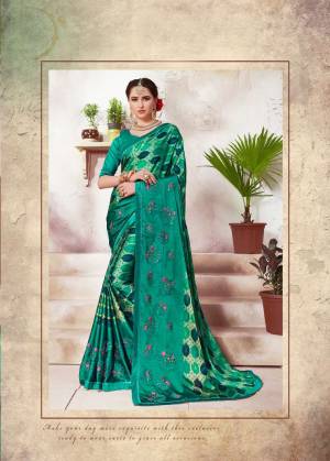 Lovely Shade In Green Is Here With This Sea Green Colored Saree Paired with Sea Green Colored Blouse. This Saree Is Fabricated On Crepe Silk Paired With Art Silk Fabricated Blouse. It Has Multiple Prints With Embroidery. Buy Now.