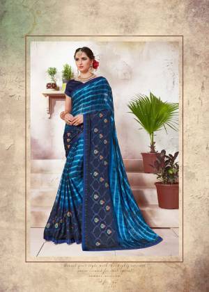 Celebrate This Festive Season Wearing This Designer Saree In Blue Color Paired With Navy Blue Colored Blouse. This Saree Is Fabricated On Crepe Silk Paired With art Silk Fabricated Blouse. It Is Durable And Easy To Care For.