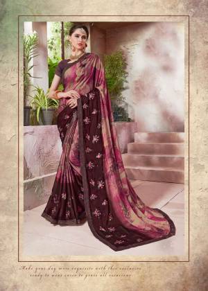 Add This Pretty Saree In Multi And Wine Color Paired With Wine Colored Blouse. This Saree Is Fabricated On Crepe Silk Paired With Art Silk Fabricated Blouse. This Saree Is Beautified With Prints And Embroidery. Buy Now.