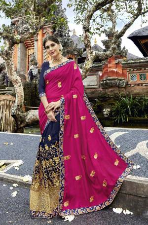 Bright And Visually Appealing Color Is Here with This Designer Saree In Dark Pink And Navy Blue Color Paired With Navy Blue Colored Blouse. This Saree Is Fabricated On Art Silk  And Georgette Paired With Art Silk Fabricated Blouse. Its Bright Colors Will Give An Attractive Look Like Never Before.