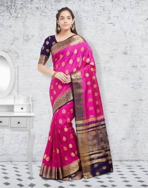 Look Pretty Wearing This Silk Saree In Pink Paired With Contrasting Violet Colored Blouse. This Saree And Blouse Are Fabricated On Banarasi Art Silk Beautified With Weave All Over. Buy This Saree Now.