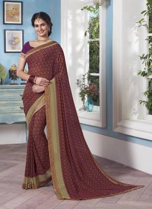 Dark And Lovely Shade Is Here With This Purple Colored Saree Paired With Purple Colored Blouse, This Saree And Blouse Are Fabricated On Georgette Beautified With Small Floral Prints All Over It.