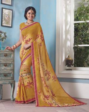 Celebrate This Festive Season With Comfort And Beauty Wearing This Saree In Musturd Yellow Color Paired With Musturd Yellow Colored Blouse. This Saree And Blouse Are Fabricated On Georgette.  It IS Easy To Drape And Durable.