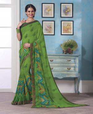 Add Some Casuals With This Simple Saree In Green Color Paired With Green Colored Blouse. This Saree And Blouse Are Fabricated On Georgette Which Ensures Superb Comfort And Earn You Lots Of Complients.