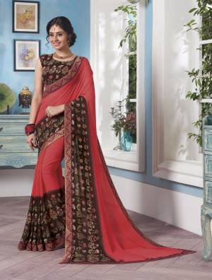Here Is An Attractive Dark Peach And Brown Colored Saree Paired With Brown Colored Blouse. This Saree And Blouse are Fabricated On Georgette Beautified With Prints And Lace Border. Buy This Saree Now.