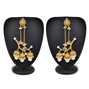 Unique Patterned Designer Earrings Set Is Here In Golden Color Beautified With White Pearl Work. This Can also Be Paired With Any Colored Traditional Attire.