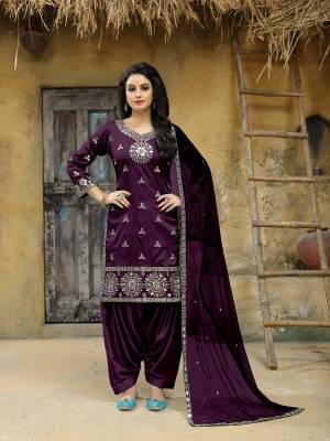 Salwar Suit Is All Time Favourite When It Comes To Comfort And Beauty, Grab This Beautiful Designer Semi-Stitched Embroidered Salwar Suit. Its Top Is Fabricated On Art Silk Paired With Santoon Bottom And Net Fabricated Dupatta. Its Fabric Ensures Superb Comfort And Earn You Lots Of Compliments From Onlookers. Buy Now.