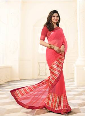 Look Pretty Wearing This Saree In Pink Color Paired With Pink Colored Blouse. This Saree Is Fabricated On Georgette Paired With Art Silk Fabricated Blouse. It Has Lovely Checkred Satin Patta Which Gives A Simple Elegant Look.