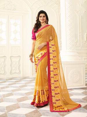 Add This Pretty Saree For Your Casual wear In Yellow Color Paired With Contrasting Pink Colored Blouse. This Saree Is Fabricated On Georgette Paired With Art Silk Fabricated Blouse. Its Bright And Pretty Combination Will Earn You Lots Of Compliments From Onlookers.