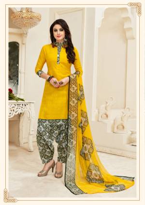 Bright Colors Gives A Pretty look When you wear It, Grab This Yellow Colored Top Paired With Grey And White Bottom And Yellow Dupatta. Its Top and Bottom Are Fabricated On Cotton Paired With Chiffon Dupatta. Buy This Dress Material Now.