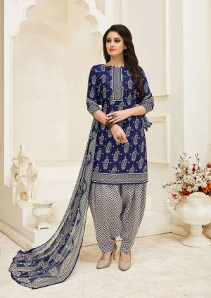Enhance Your Personality Wearing This Dress Materail In Dark Blue Color Paired With White And Blue Colored Bottom And Dupatta. Its Top And Bottom Are Fabricated On Cotton Paired With Chiffon Dupatta.Buy Now And Get This Dress Material Stitched.