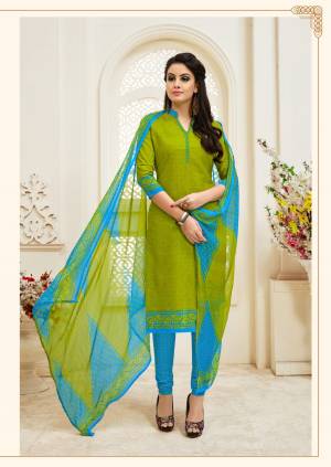 This Summer Beat The Heat With Cool Color Pallete, With This Dress Material In Green Colored Top Paired With Contrasting Tuquoise Blue Colored Bottom And Green And Blue Dupatta, Also This Dress Material Is Fabricated On Cotton Which Is Perfect For Summer.