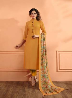 Celebrate This Festive Season Wearing This Readymade Suit In Musturd Yellow Color Paired With Multi Colored Dupatta. Its Top Is Fabricated On Muslin Silk Paired With Santoon Bottom And Muslin Silk Dupatta. Its Attractive Color And Elegant Design Will Earn You Lots Of Compliments From Onlookers.