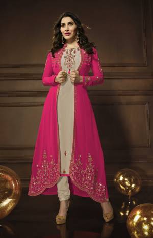 Shine Bright With This Beautiful Designer Suit In Beige Colored Top, Bottom And Dupatta Paired With Rani Pink Colored Jacket. Its Top, Jacket And Dupatta Are Fabricated On Georgette Paired With Santoon Bottom. This Trendy Suit Will Earn You Lots Of Compliments From Onlookers.