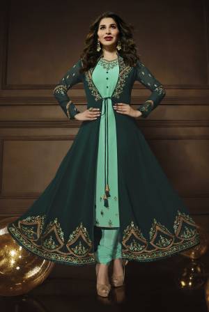 Go With The Shades Of Green With This Attractive Jacket Patterned Suit In Sea Green Colored Top, Bottom And Dupatta Paired With Teal Green Colored Jacket. Its Top, Jacket And Dupatta Are Fabricated On Georgette Paired With Santoon Bottom. Buy Thi Semi-Stitched Suit Now.