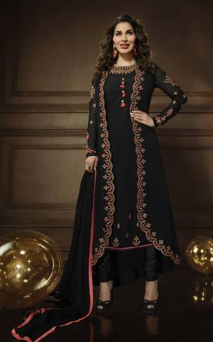 Enhance Your Personality, Wearing This Designer Jacket Patterned Suit In Black Color. Its Top, Jacket And Dupatta Are Georgette Base Fabric Paired With Santoon Bottom. It Is Beautified With Contrasting Attractive Embroidery Which Will Earn You Lots Of Compliments From Onlookers. 