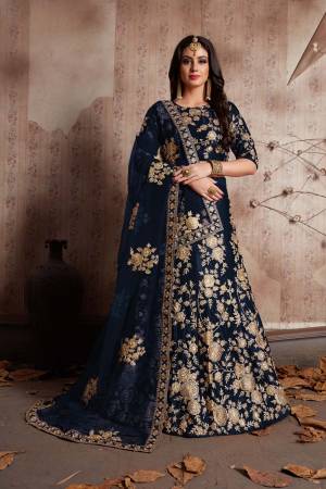 This set features a Navy blue velvet dori work lehenga choli set. It comes along with lace work dupatta and heavy embroidery on dupatta's net. Matching blouse with heavy dori dori work.Looks completely heavy work.