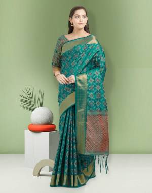 Here Is A Lovely Shade In Green With This Silk Saree In Teal Green Color Paired With Teal Green Colored Blouse. This Saree And Blouse Are Fabricated On Art Silk Beautified With Weave All Over. It Is Light Weight And Easy To Drape.