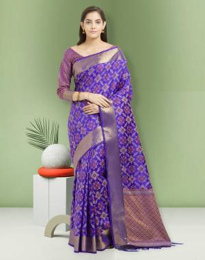 New Shade Is Here To Add Into Your Wardrobe With This Silk Saree In Violet Color Paired With Violet Colored Blouse. This Saree And Blouse are Fabricated On Art Silk Beautified With Weave All Over.
