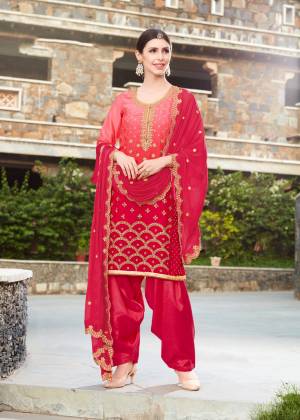 Look Pretty Wearing This Desingner Semi-Stitched Suit In Dark Pink Color Paired With Dark Pink Colored Bottom And Dupatta. Its Top Is Fabricated On Soft Silk Paired With Santoon Bottom And Chiffon Dupatta. It Is Beautified With Jari Embroidery And Stone Work.