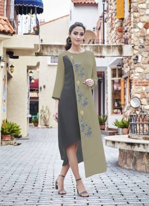 Flaunt Your Rich And Elegant Taste Wearing This Designer Readymade Kurti In Khaki And Beige Color Fabricated Georgette. This Kurti Is Beautified With Embroidery Making The Kurti Attractive.