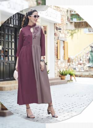 Here Is A Lovely Readymade Designer Kurti In Magenta Pink And Mauve Color Fabricated On Georgette This Kurti Is Beautified With Embroidery Over The Yoke. Also It Is Available In All Regular Sizes.