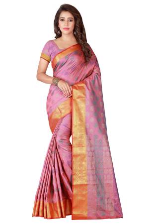 Look Pretty Wearing This Saree In Dusty Pink Color Paired With Dusty Pink Colored Blouse. This Saree And Blouse Are Fabricated On Banarasi Art Silk Beautified With Multi Colored Weave. Buy Now.