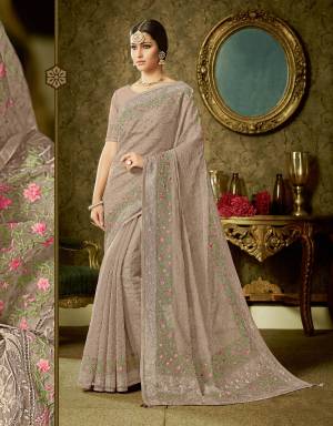 This classic shade of Sand Grey is sure to never leave your side and make you an epitome of sheer elegance and beauty. Adorn it with equally classic kundans for a timeless appeal. 