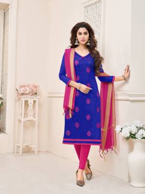Bright colors are evergreen and for every season, So grab this dress material in royal blue colored top paired with contrasting dark pink colored bottom and dupatta. Its top and bottom are fabricated on cotton paired with chanderi dupatta. Buy thi suit now.