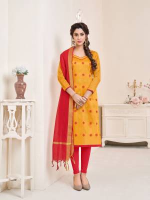 Orange and red color induces perfect summery appeal to any outfit, so grab this dress material in orange colored top paired with contrasting red colored bottom and dupatta. Its top and bottom are cotton based paired chanderi dupatta. Buy this suit now.