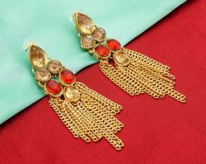 Grab This Beautiful Trendy Set Of Earrings In Golden Color Beautified With Beige And Orange Colored Stones. This Earring Set Can Be Paired With Red Or Any Contrasting Colored Ethnic Attire.