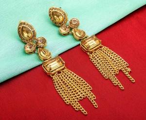 Grab This Beautiful Set Of Earrings In Golden Color Beautified with Beige Colored Stone Work. This Can Be Paired With Any Colored Ethnic Attire. Buy Now