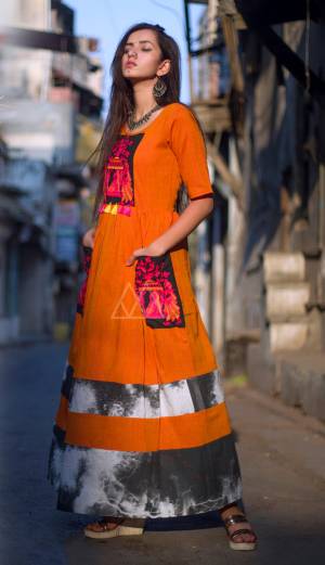 ORANGE LINEN MAXI DRESS WITH EMBROIDERED POCKET ON BOTH SIDE
ADDED WITH BLACK AND WHITE SHIBORI DIGITAL PRINT