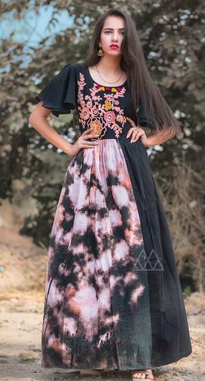 BLACK LINEN LONG MAXI DRESS WITH EMBROIDERED YOKE AND UMBRELLA SLEEVES
ADDED WITH PEACH AND BLACK SHIBORI DIGITAL PRINT