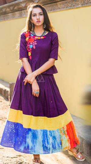 PURPLE SKIRT TOP WITH ONE SIDE EMBROIDERED EMBELLISHED WITH TASSELS
ADDED WITH DIGITAL PRINT