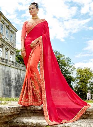 Shine Bright Wearing This Lovely Designer Saree In Dark Pink And Orange Color Paired With Orange Colored Blouse. This Saree Is Fabricated On Georgette Paired With Art Silk Fabricated Blouse. Its Bright Color And Embroidery Is Making The Saree More Attractive.